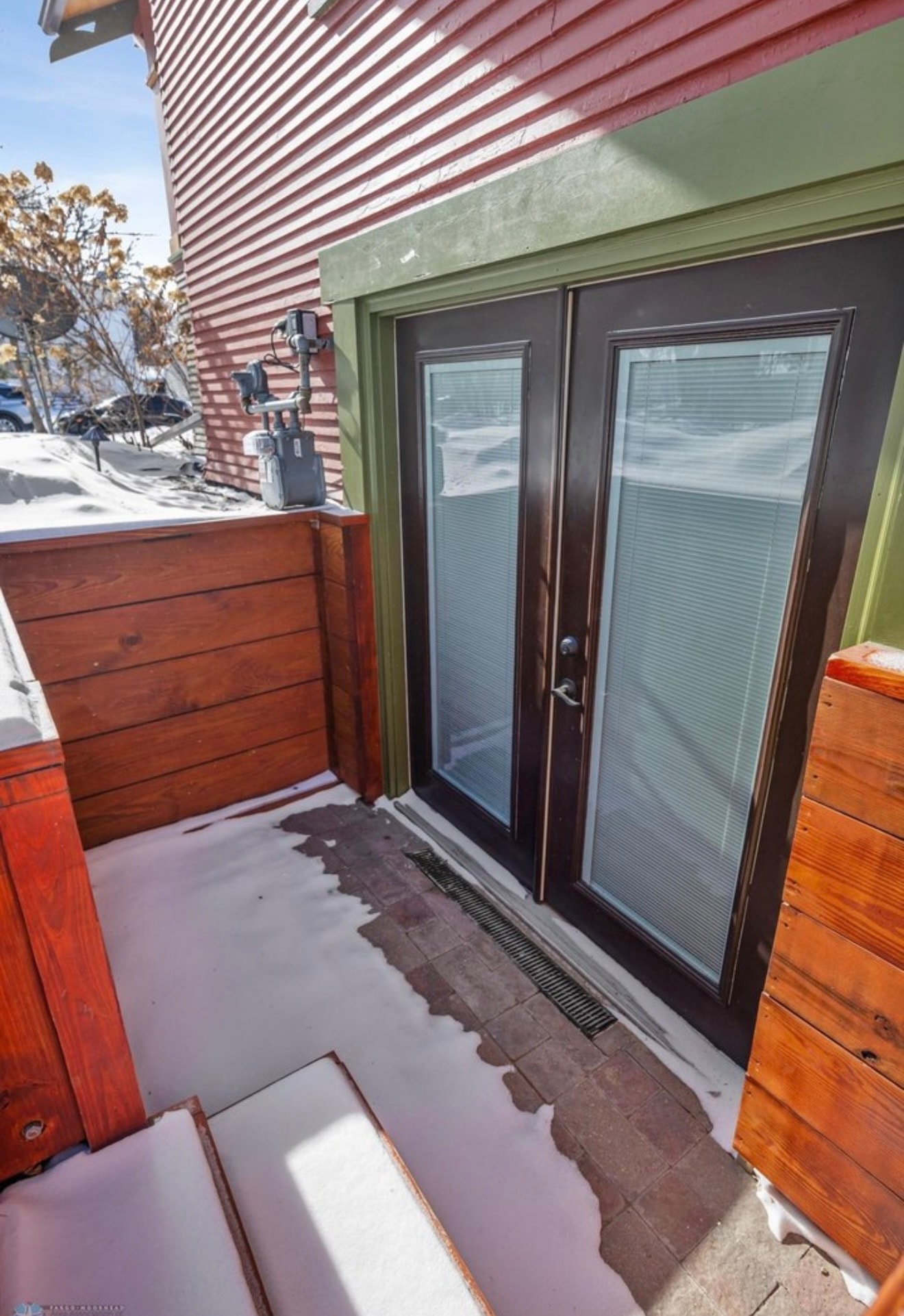 Exterior — craftsman back door with wood deck and cedar privacy fence